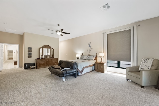 carpeted bedroom featuring ceiling fan