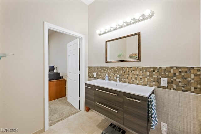 bathroom featuring tile patterned flooring and vanity