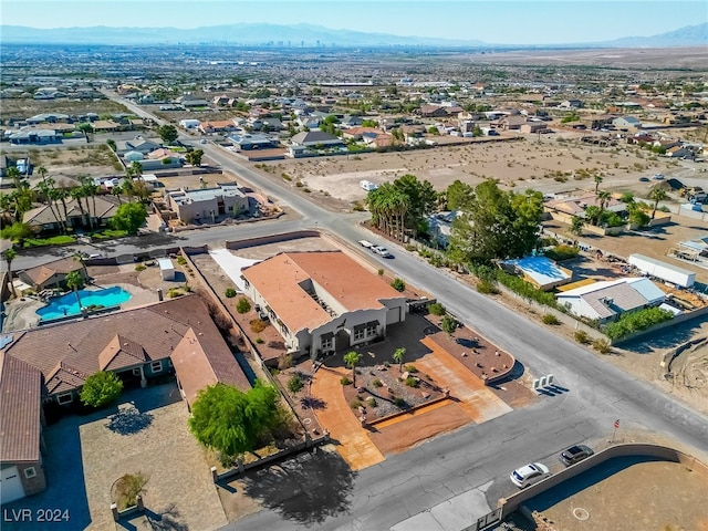 drone / aerial view featuring a mountain view