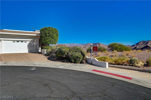 view of front of home featuring a mountain view