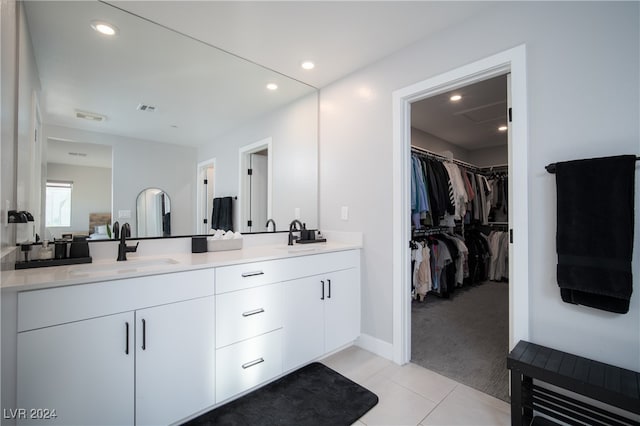 bathroom featuring tile patterned floors and vanity