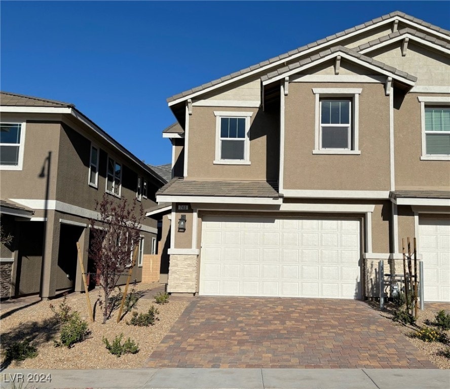 view of front of property featuring a garage