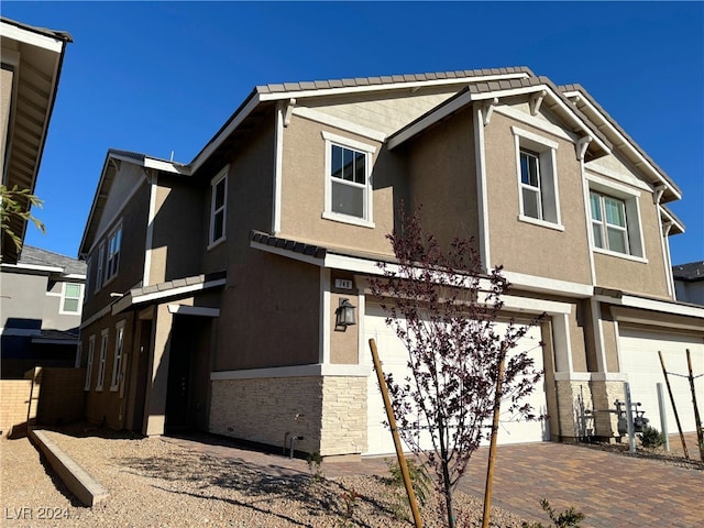 view of front of home with a garage