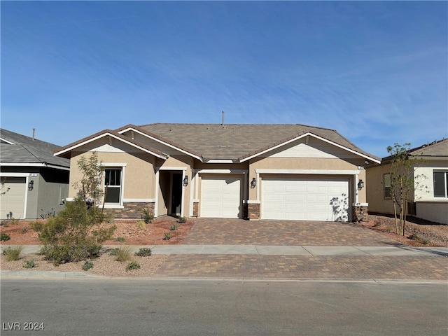 view of front of home with a garage