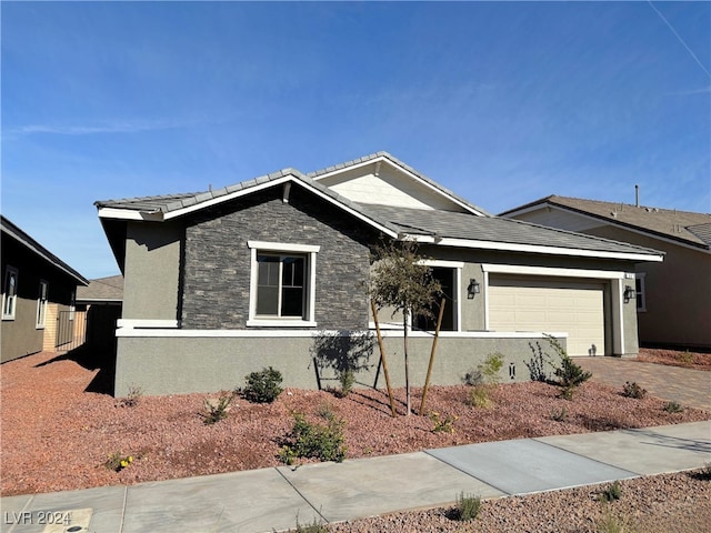 ranch-style house with a garage