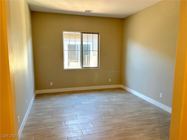 empty room featuring light hardwood / wood-style floors