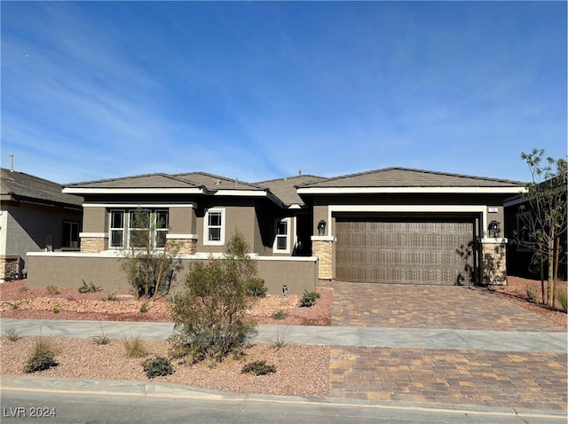 prairie-style house with a garage