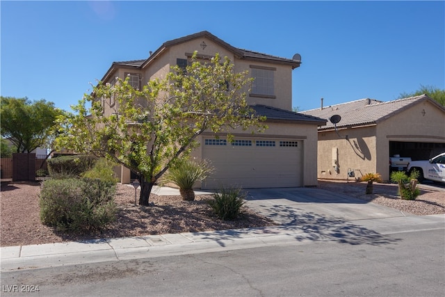 front of property featuring a garage