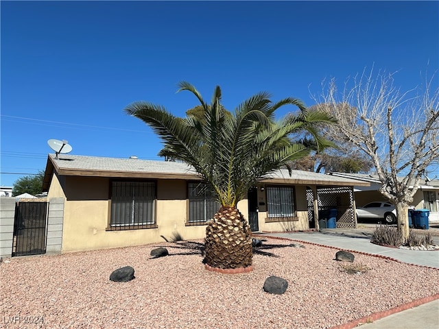 view of front of house featuring a carport