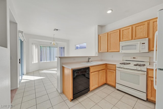 kitchen with pendant lighting, light tile patterned flooring, sink, white appliances, and light brown cabinetry