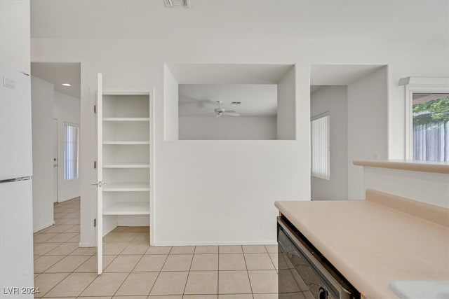 kitchen with light tile patterned floors