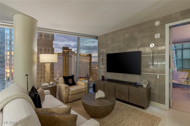 living room featuring tile walls