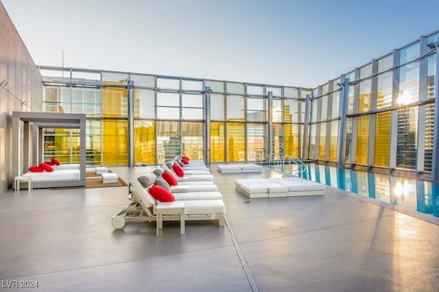 view of patio terrace at dusk