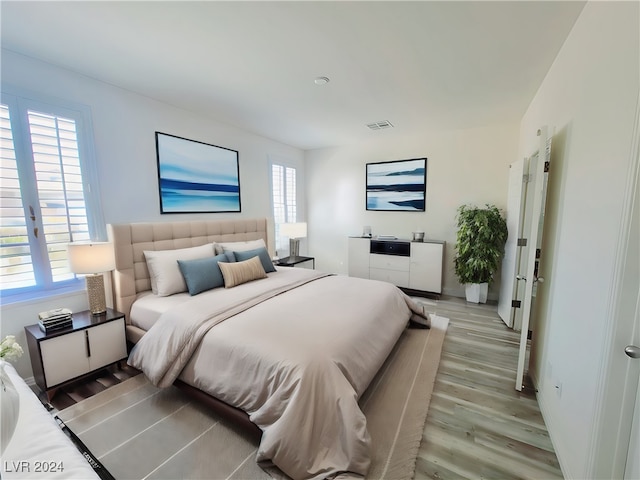 bedroom featuring light hardwood / wood-style flooring