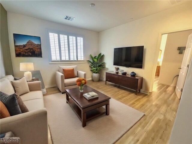 living room featuring light wood-type flooring