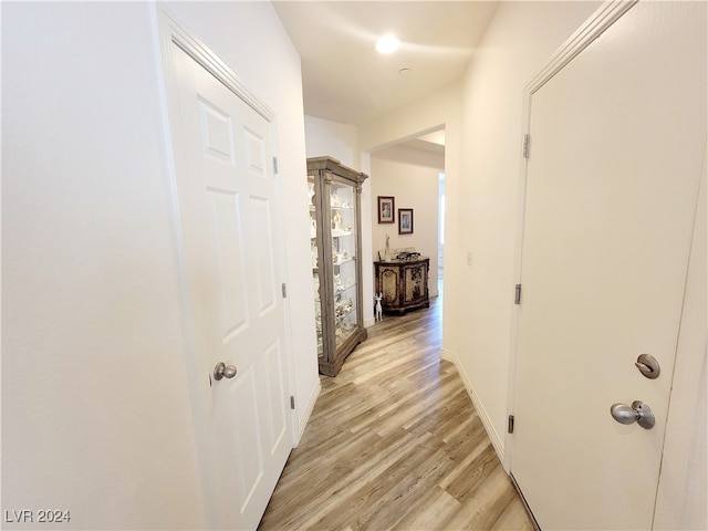 corridor featuring light wood-type flooring