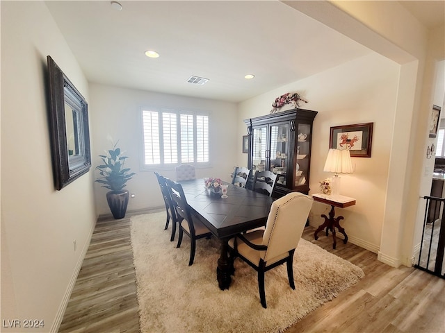 dining area featuring hardwood / wood-style flooring