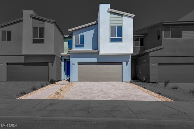 view of front of property featuring a garage