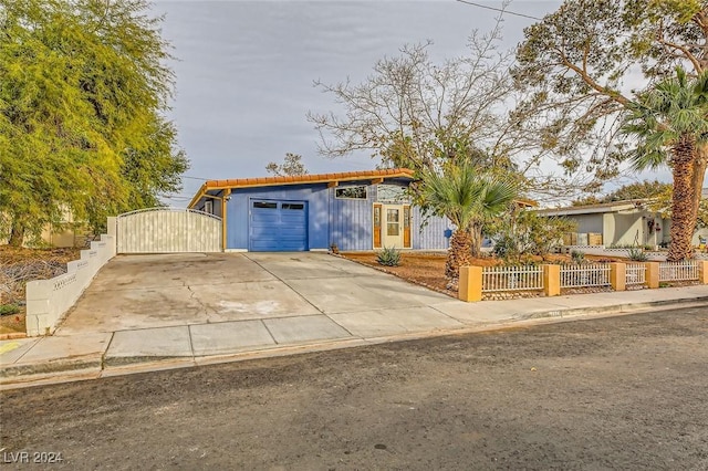 ranch-style home with a garage