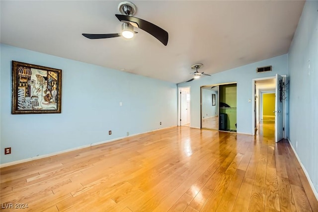 unfurnished bedroom featuring light hardwood / wood-style floors and ceiling fan