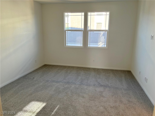 empty room featuring carpet floors