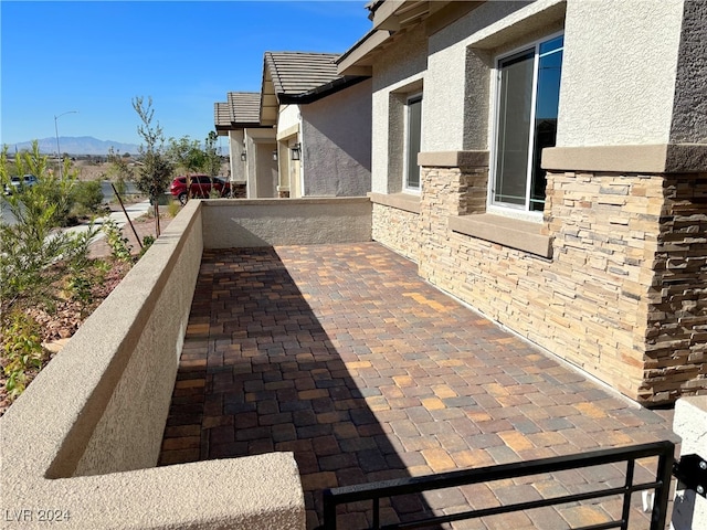 view of patio with a mountain view