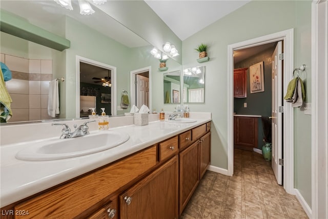 bathroom with ceiling fan and vanity