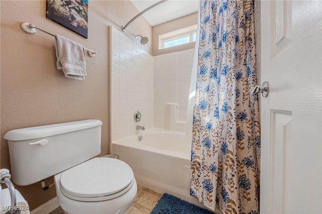 bathroom featuring tile patterned floors, shower / tub combo, and toilet