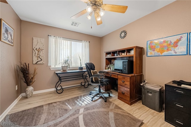 office with ceiling fan and light wood-type flooring