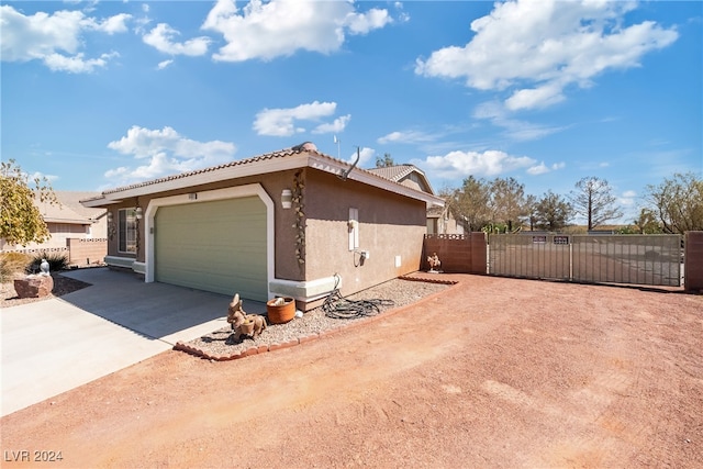 view of home's exterior featuring a garage