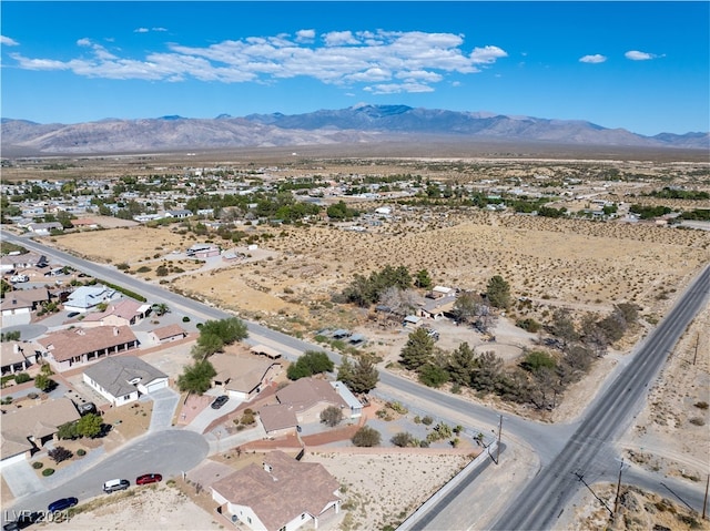 bird's eye view with a mountain view