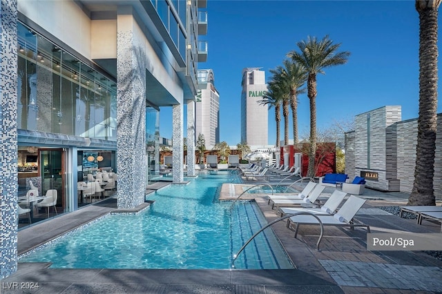 view of swimming pool with a patio