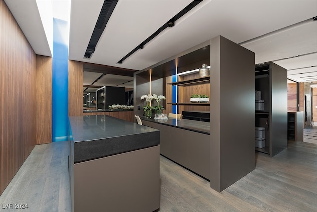 kitchen featuring a kitchen island and light hardwood / wood-style flooring