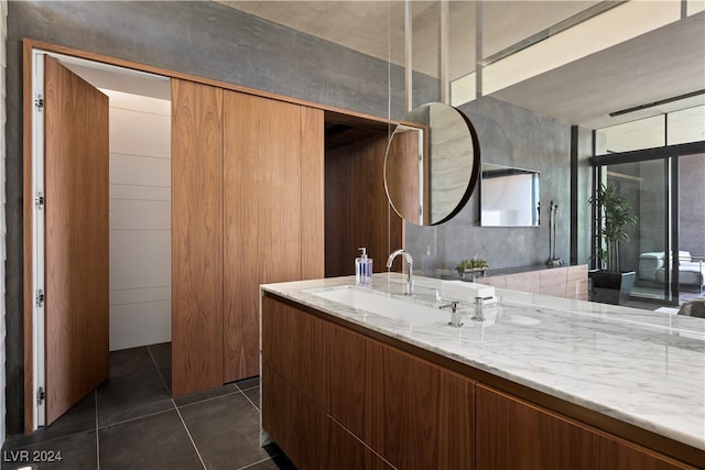 bathroom featuring vanity and tile patterned flooring