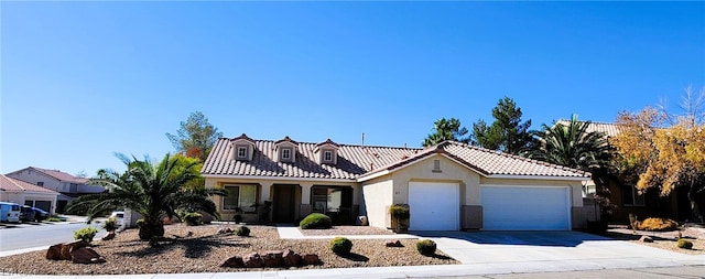 view of front of home featuring a garage and a porch