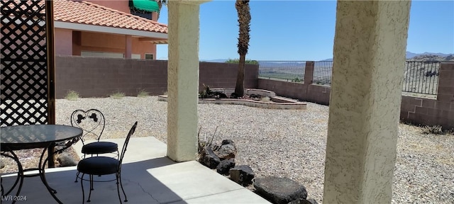 view of patio featuring a mountain view