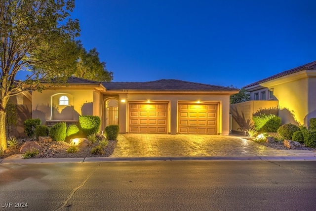 view of front of home with a garage