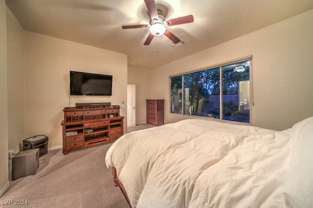 bedroom featuring ceiling fan and light colored carpet