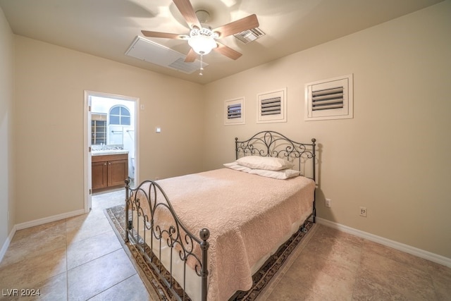 tiled bedroom with ceiling fan and ensuite bathroom