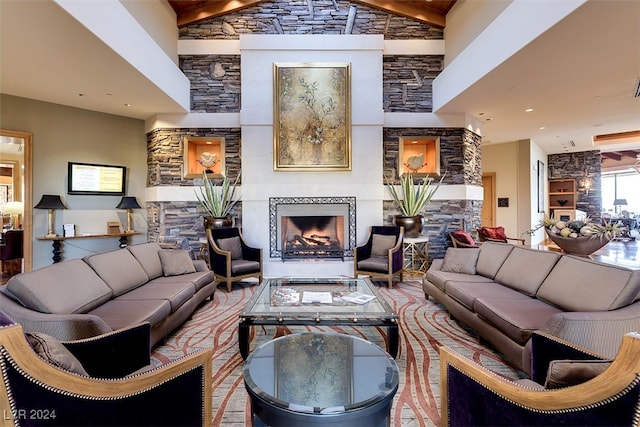 living room with high vaulted ceiling and beamed ceiling