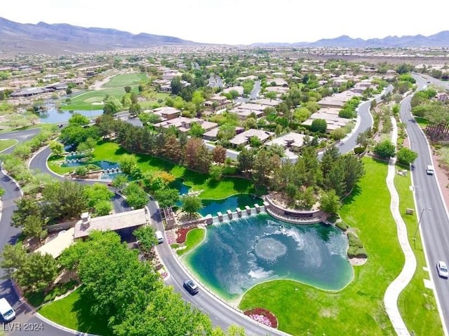 bird's eye view featuring a water and mountain view