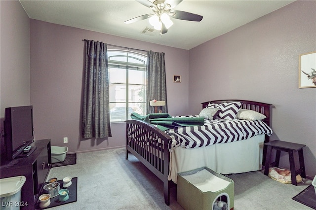 carpeted bedroom featuring ceiling fan