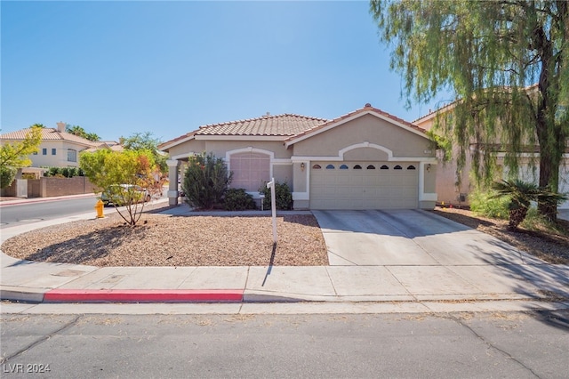 view of front of home with a garage