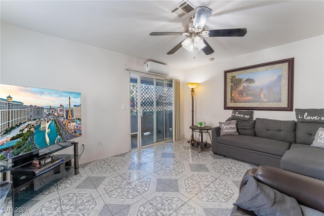 living room featuring ceiling fan and an AC wall unit