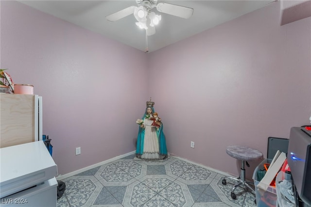 tiled office space with ceiling fan