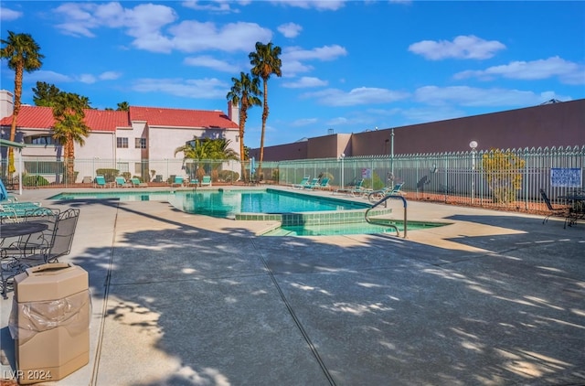 view of swimming pool featuring a patio