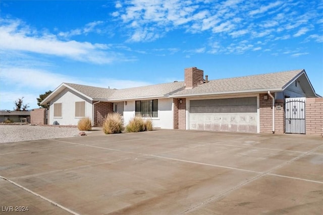 single story home with a garage