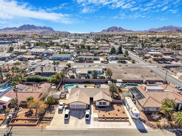 bird's eye view with a mountain view