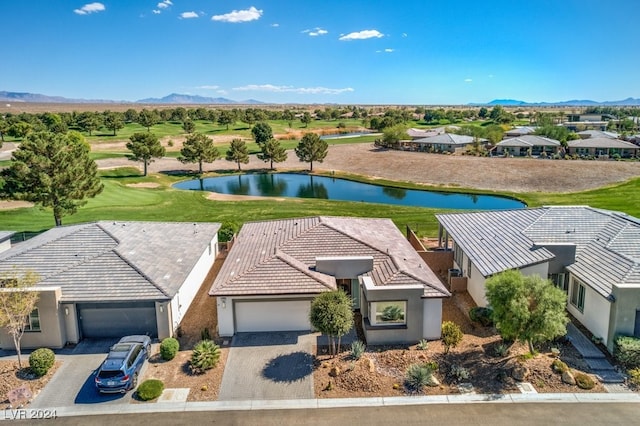 bird's eye view featuring a water and mountain view