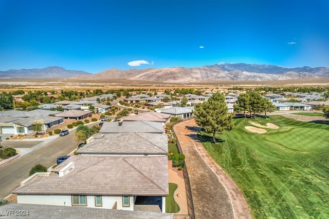 birds eye view of property featuring a mountain view